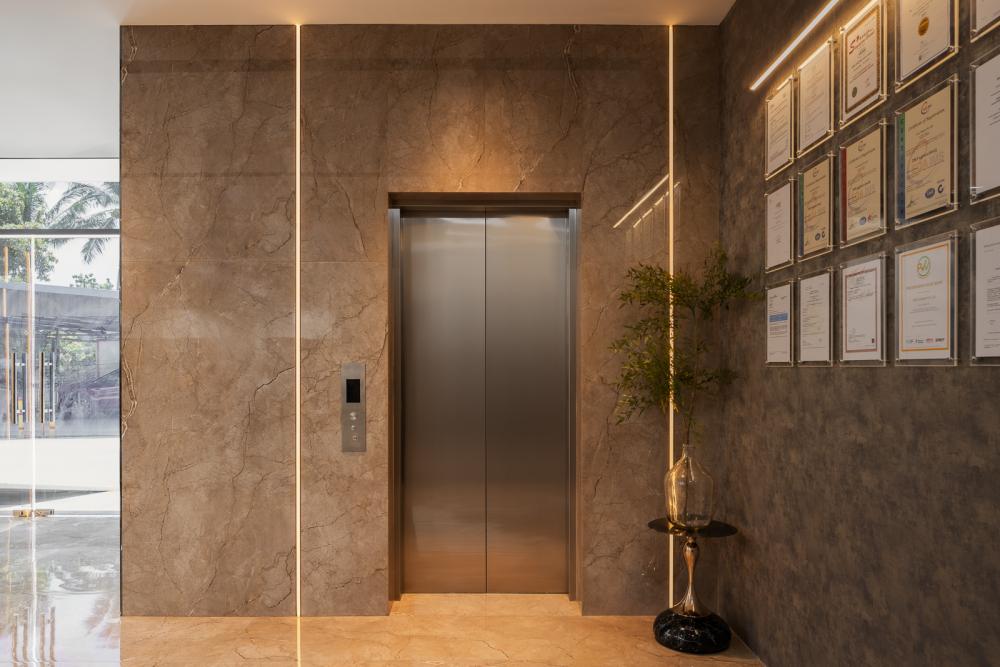 Modern Foyer with Artwork and Planters