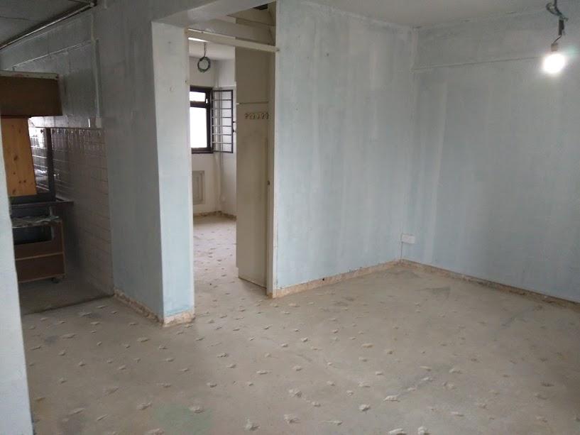 Asian Living Room with Cement Floor and Granite Floor