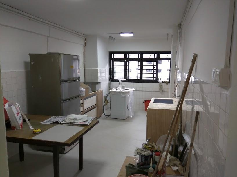 Asian Kitchen with Homogeneous Tiles and Cement Floor