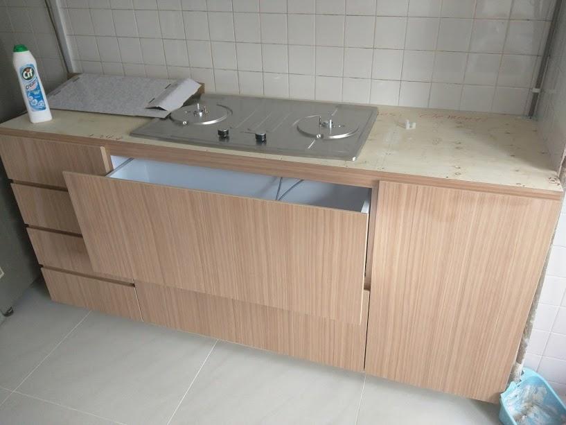 Asian Kitchen with Homogeneous Tiles and Kitchen Island