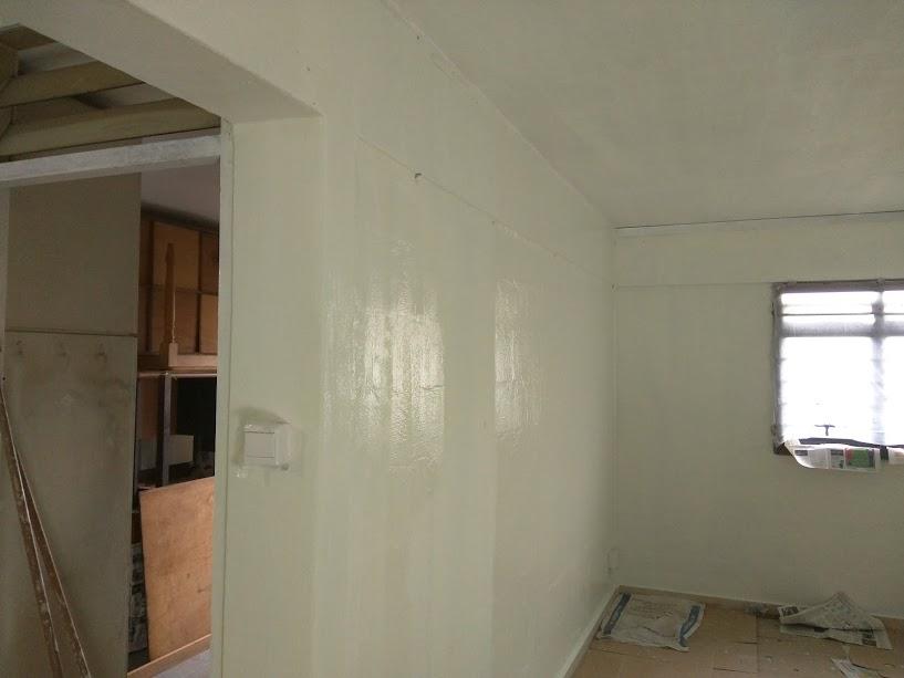 Asian Living Room with TV Console and Feature Wall