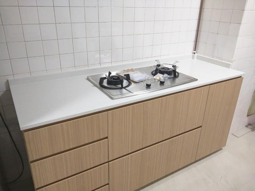 Asian Kitchen with Homogeneous Tiles and Cement Floor
