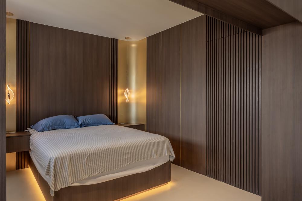 Minimalist Bedroom with Cement Floor and Feature Wall