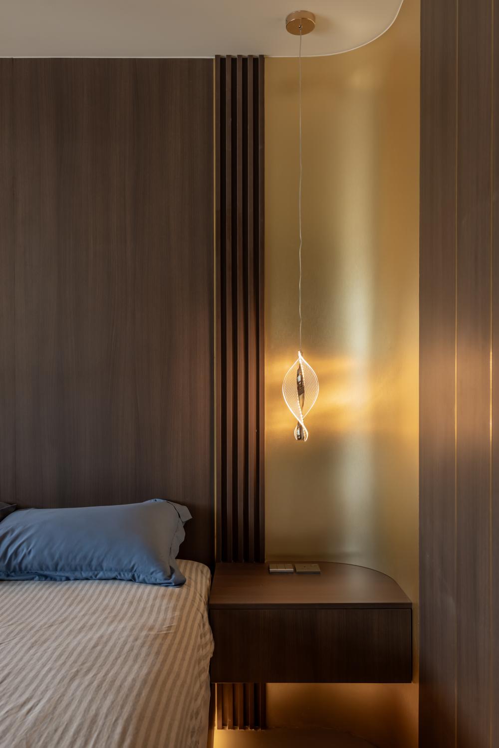 Minimalist Bedroom with Cement Floor and Feature Wall