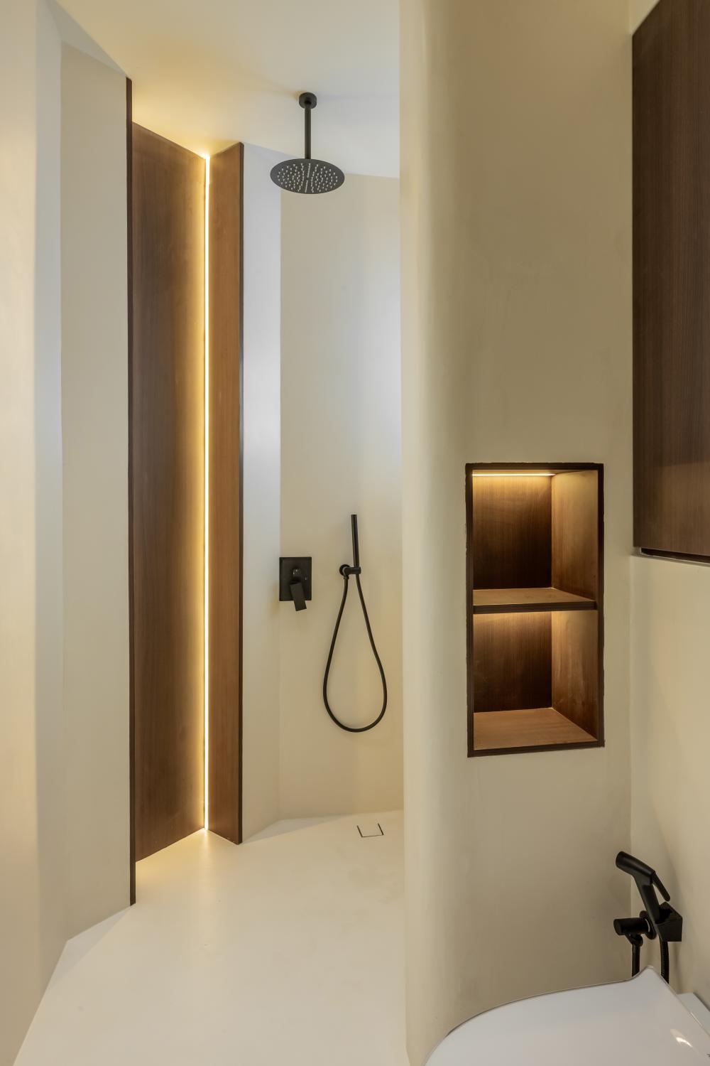 Minimalist Bathroom with Cement Floor and Rainshower