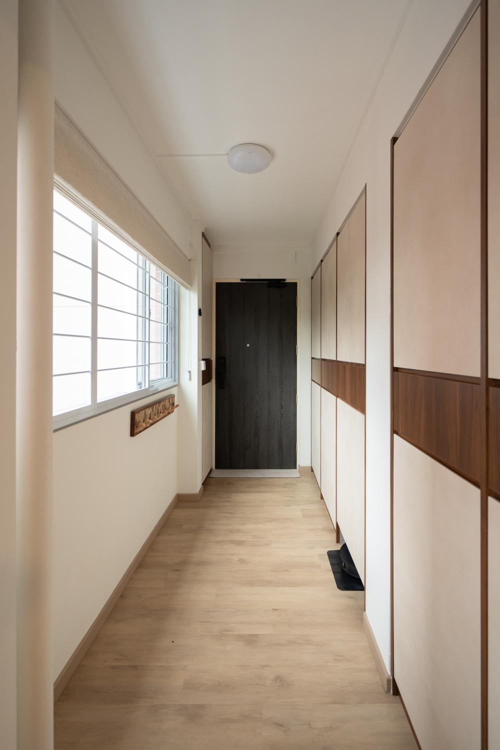 Modern Entryway with Parquet Floor and Small Storage