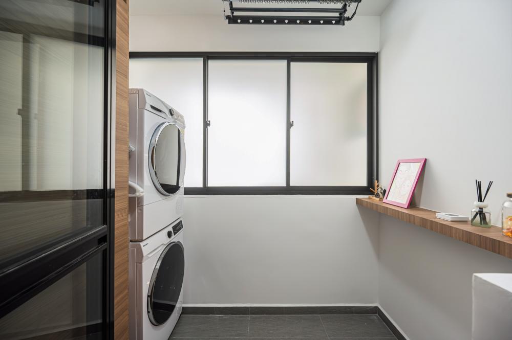 Minimalist Service Yard with Washing Machine and Laundry Area
