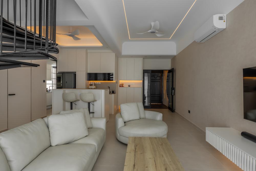 Minimalist Living Room with Cove Lighting and Drop Ceiling