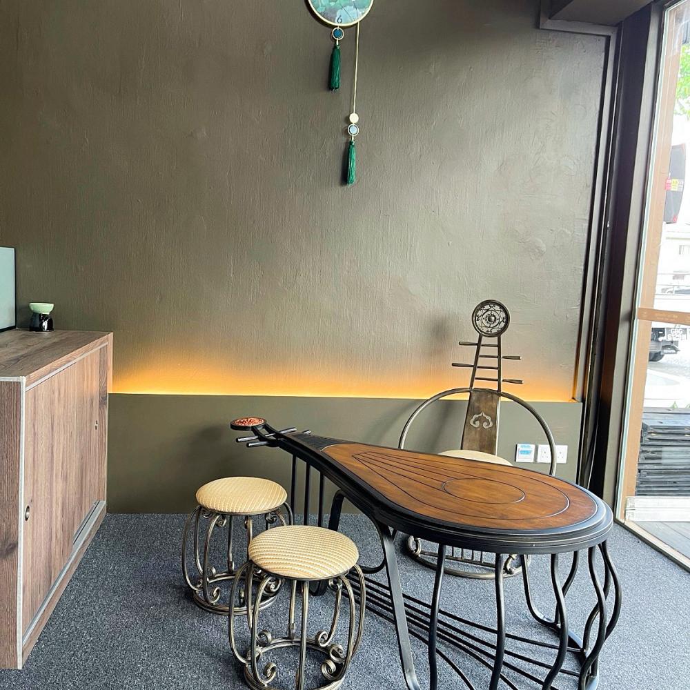 Modern Shopfront with Paintings and Coffee Table