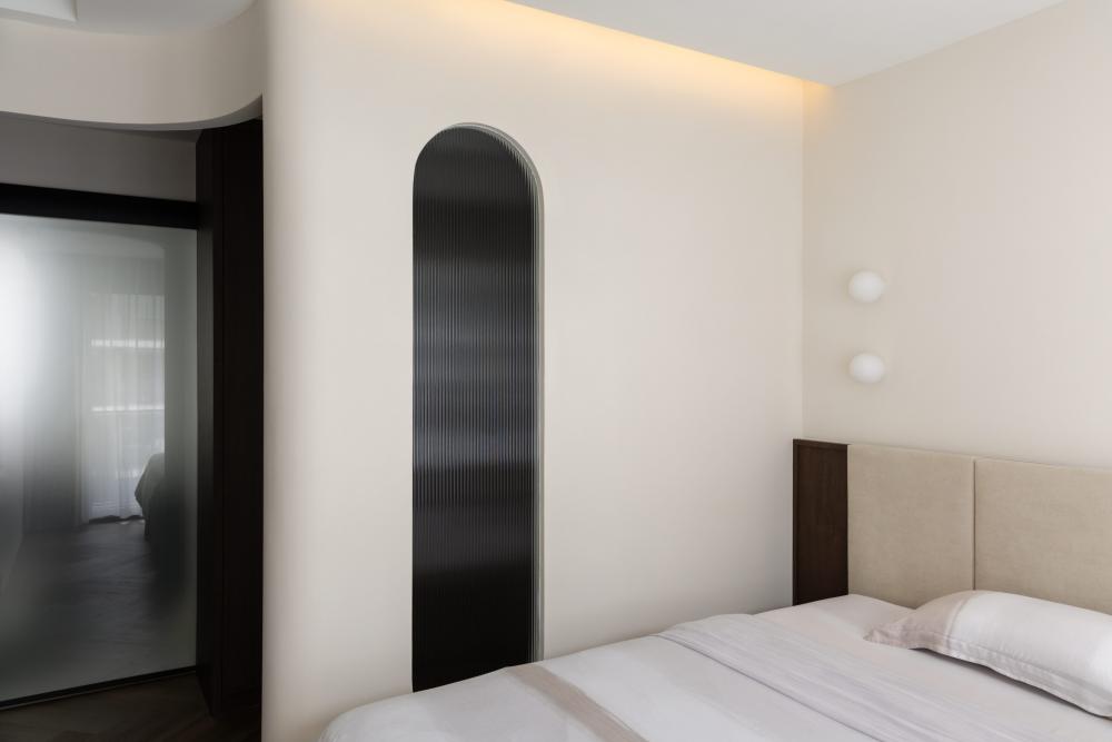 Modern Bedroom with Feature Wall and Glass Door