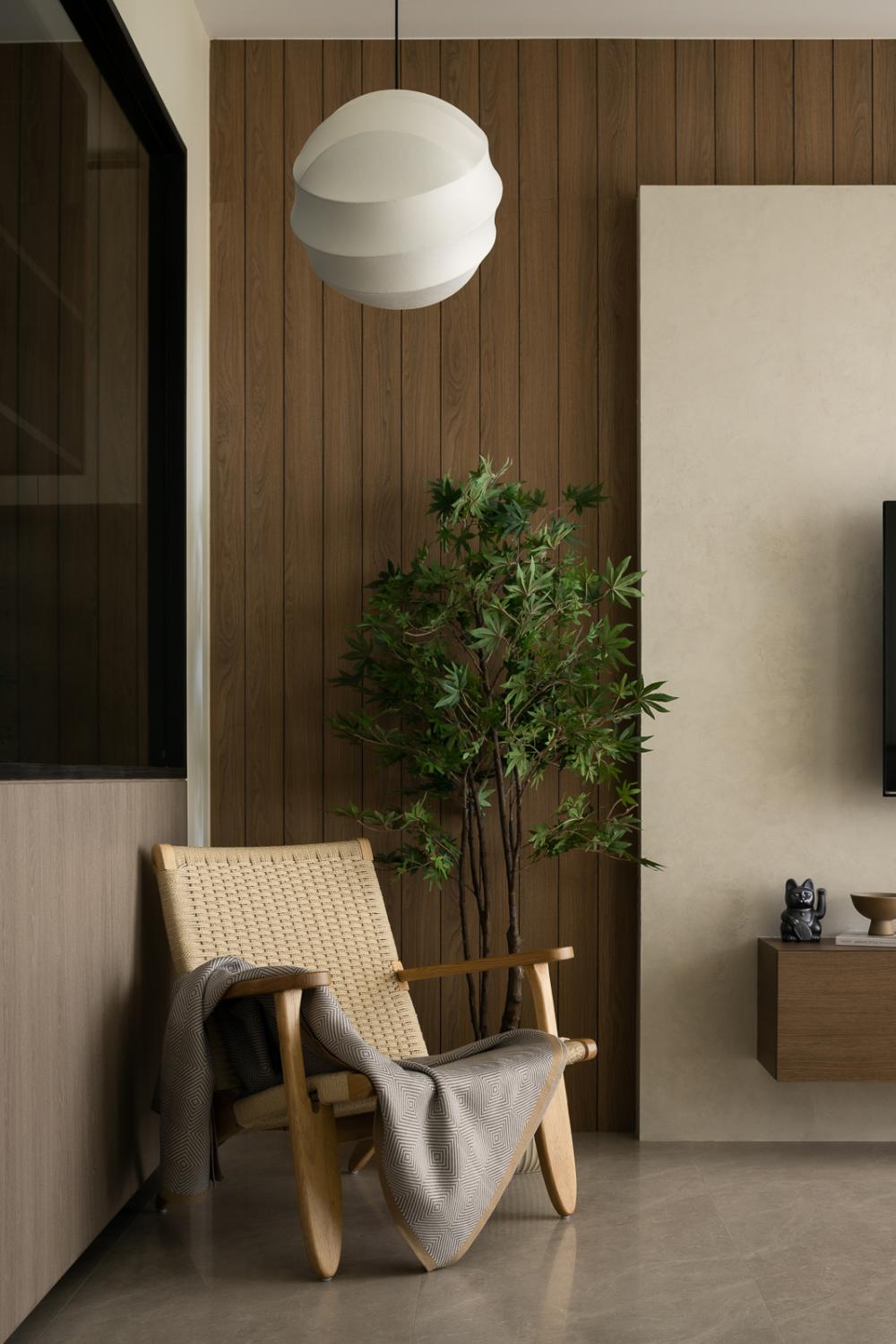 Asian Living Room with Feature Wall and Armchairs