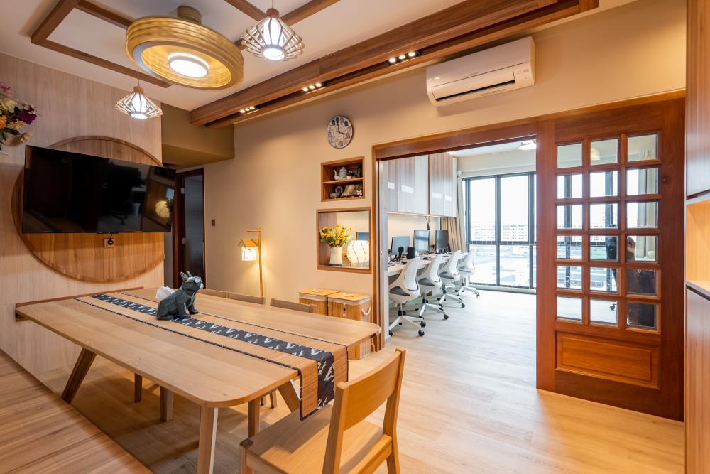 Asian Home Office with Bookshelf and Desk Chairs