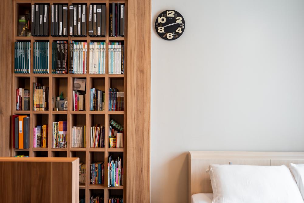 Asian Bedroom with Bookshelf and Storage Cabinets