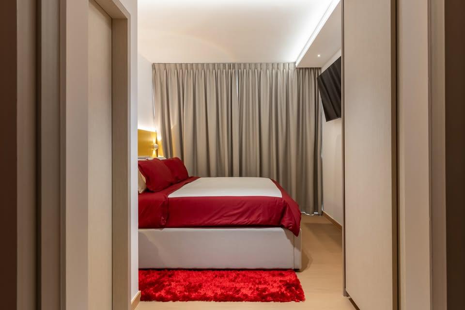 Modern Bedroom with Wood Flooring and Queen Bed