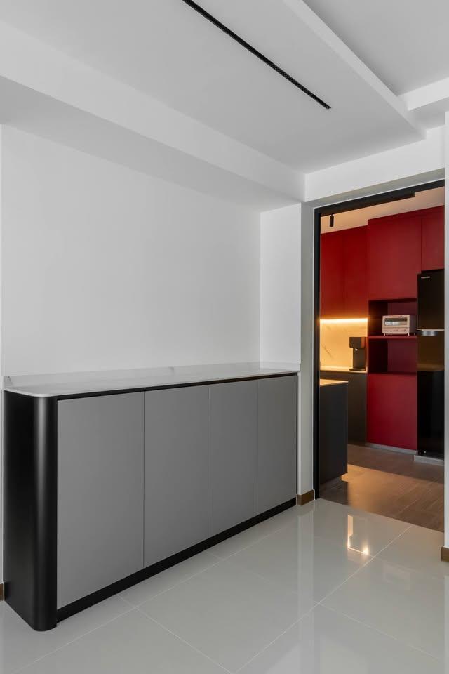 Modern Hallway with Bookshelf and Paintings