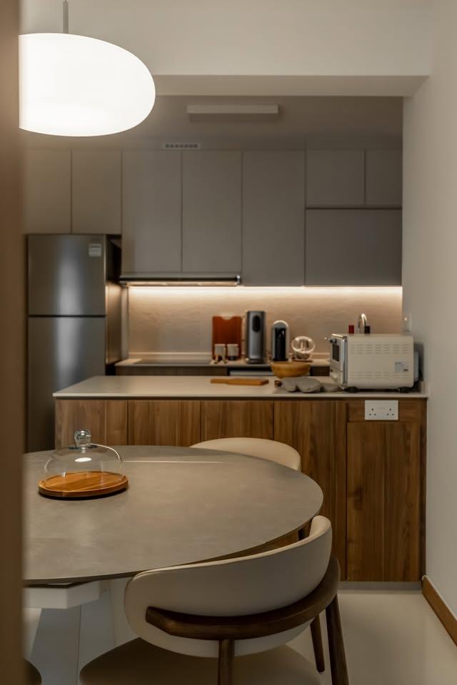 Minimalist Dining Room with Drop Light and Dining Table