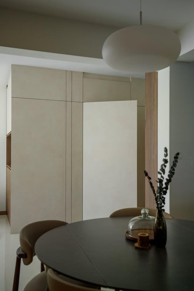 Minimalist Dining Room with Drop Light and Dining Table