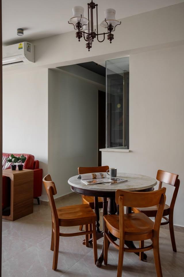 Contemporary Dining Room with Chandelier and Dining Table