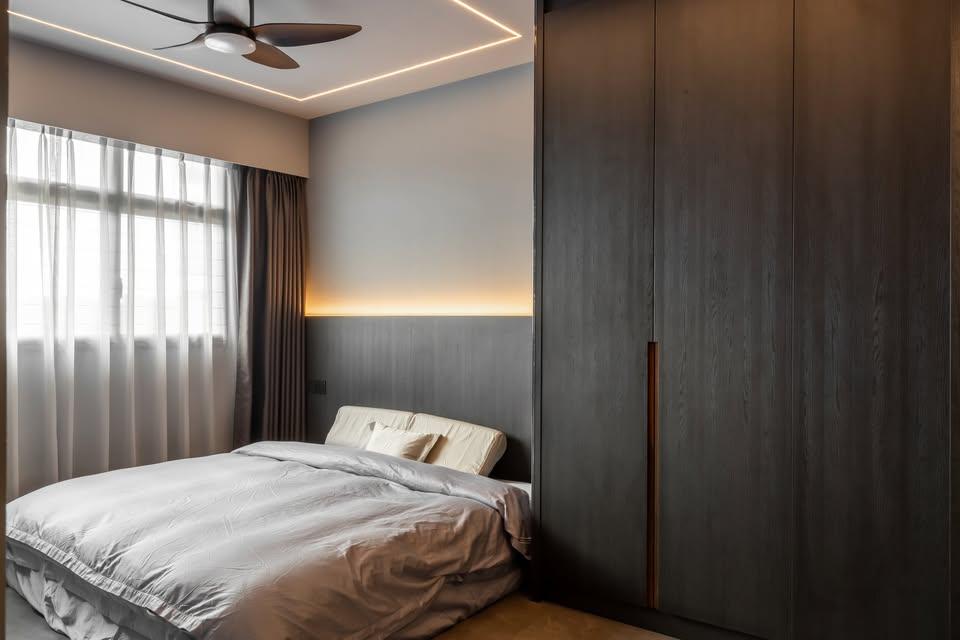 Contemporary Bedroom with Cove Lighting and Wardrobe