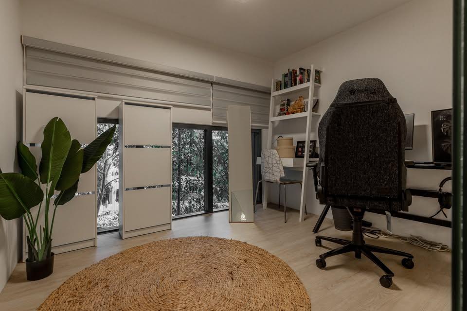 Modern Home Office with Shelving Units and Computer