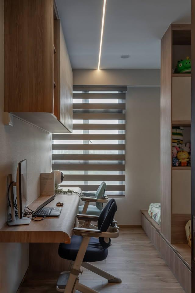 Modern Home Office with Wall Shelves and Computer