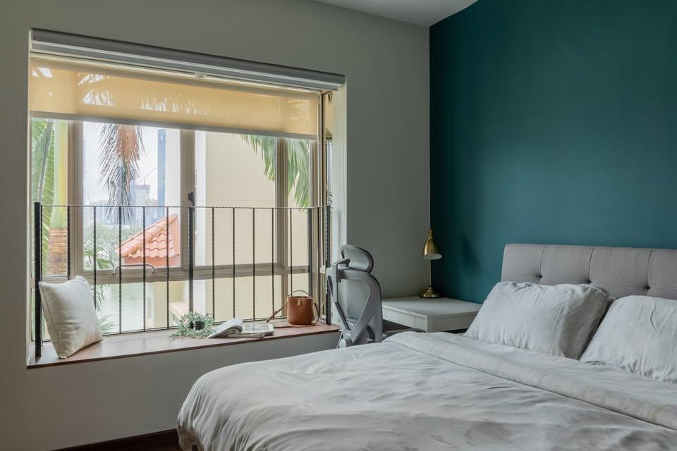 Eclectic Bedroom with Bay Window and Bedside Table