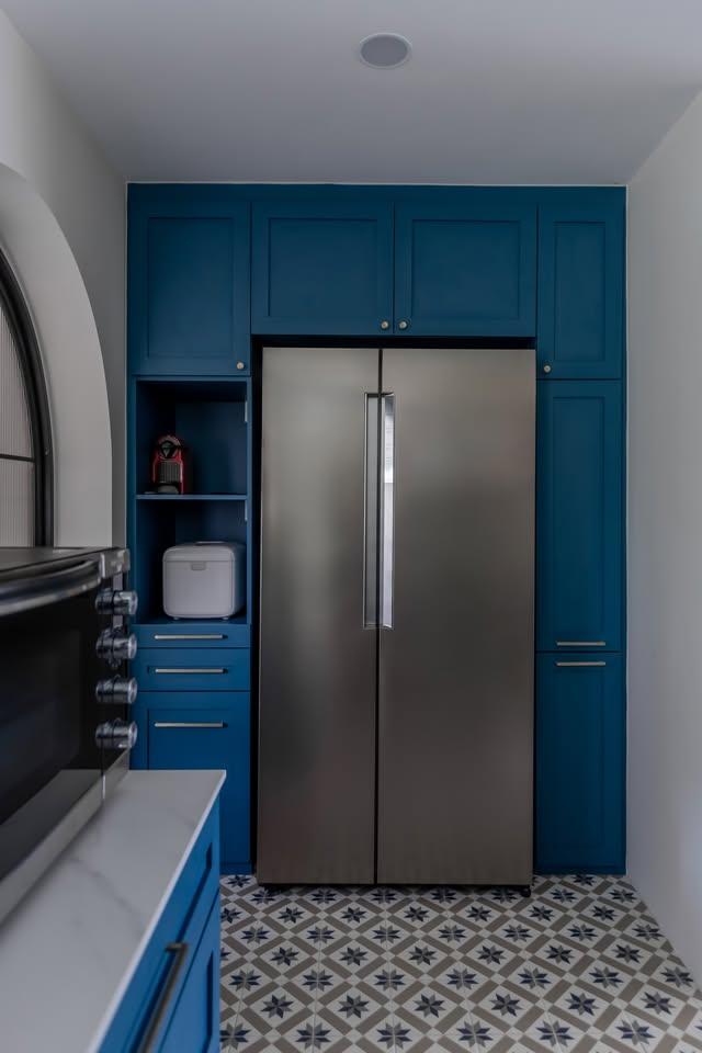 Eclectic Kitchen with Kitchen Cabinets and Refrigerator