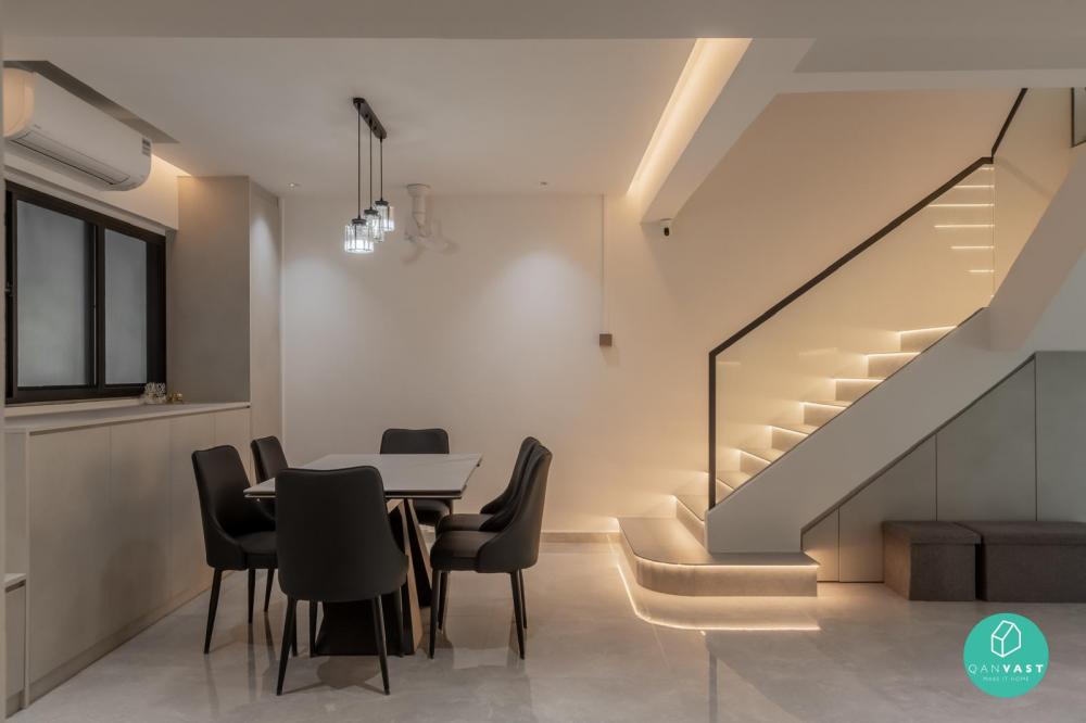 Contemporary Dining Room with Cove Lighting and Chandelier