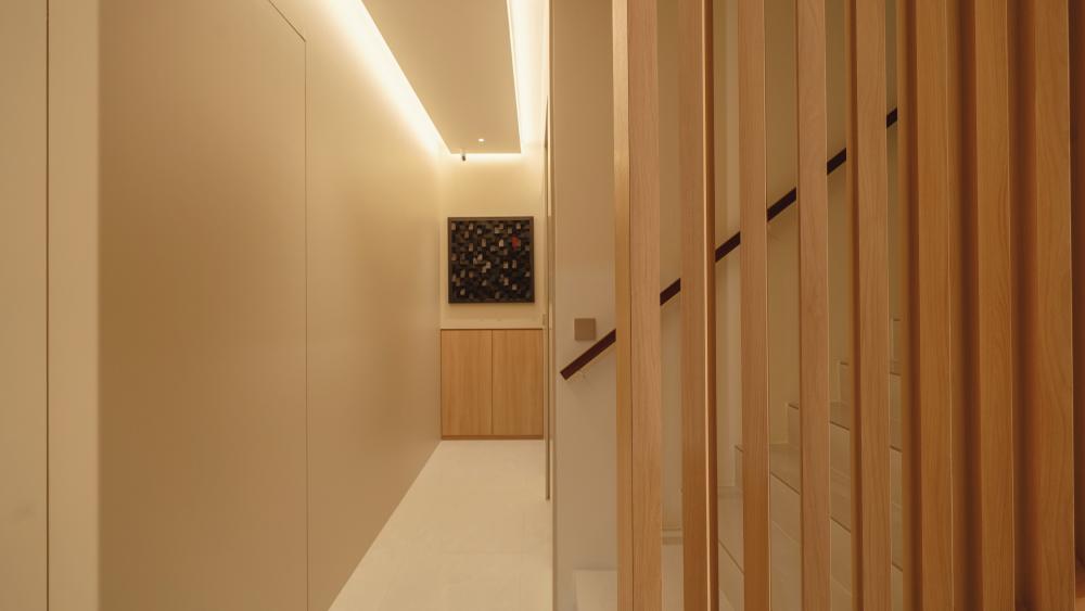 Modern Foyer with Staircase and Artwork