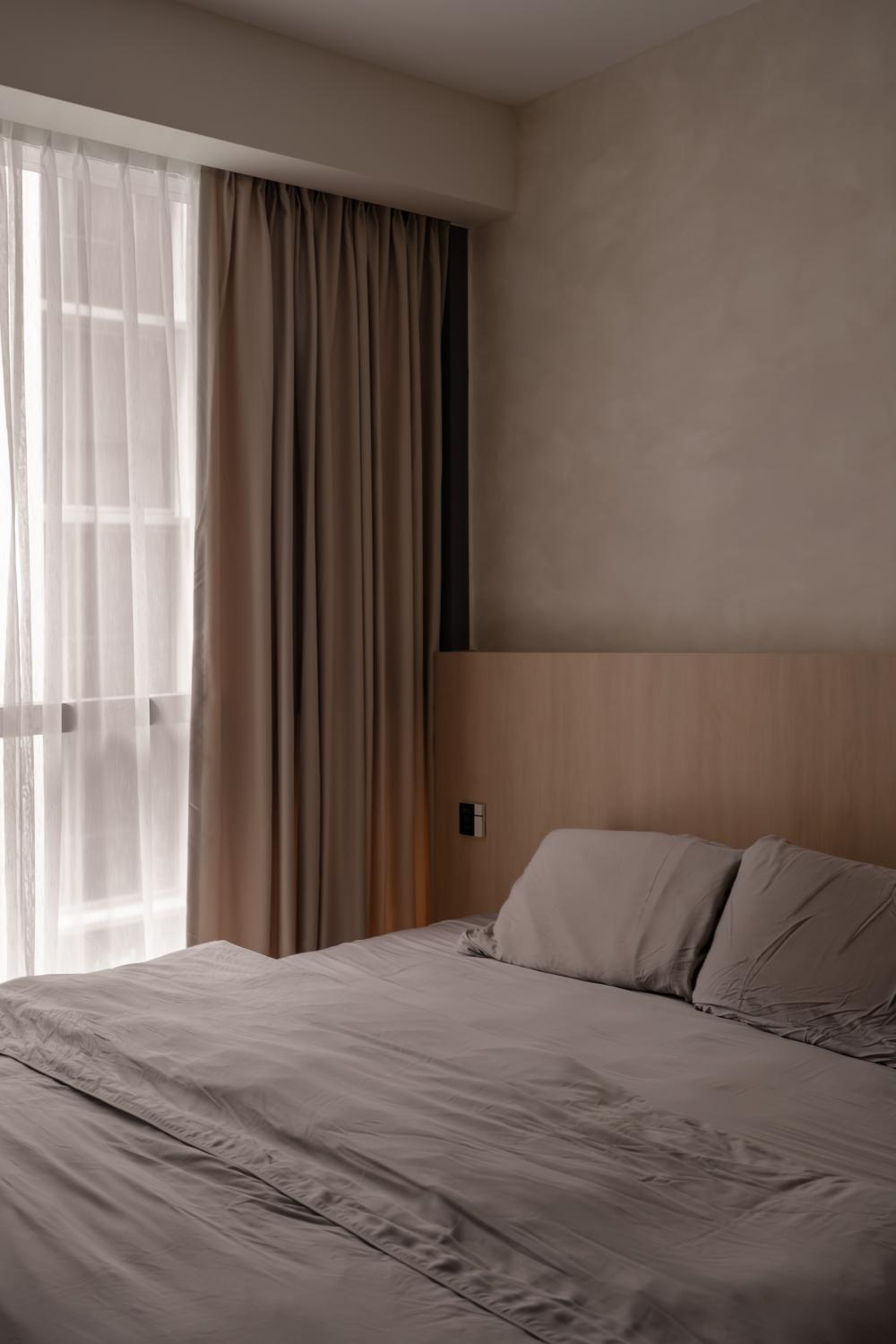 Minimalist Bedroom with Platform Bed and Built-in Bed