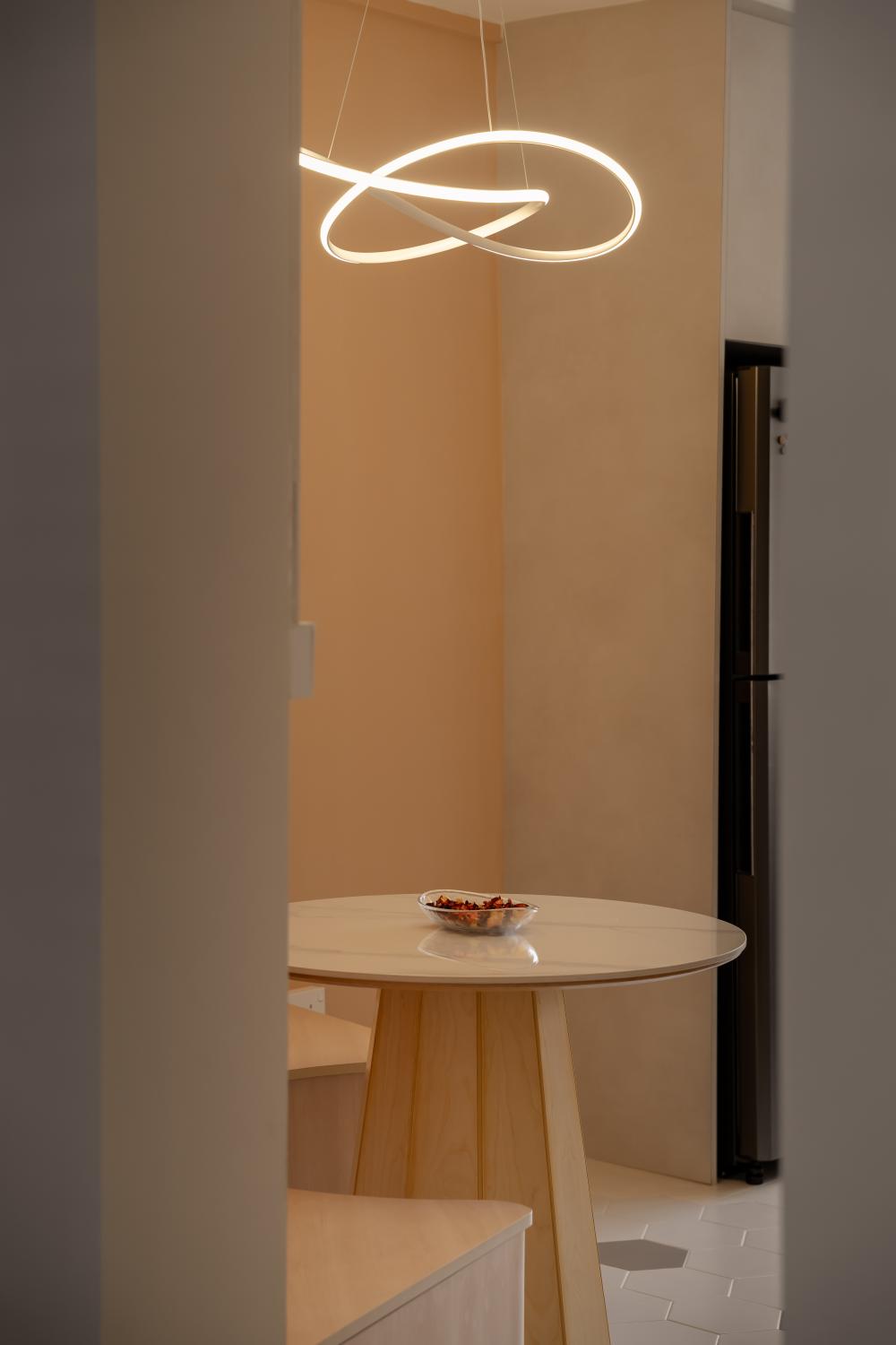 Modern Dining Room with Drop Light and Dining Table