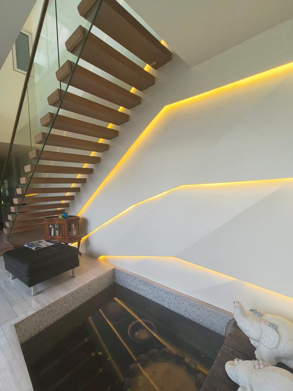 Minimalist Hallway with Feature Wall and Paintings