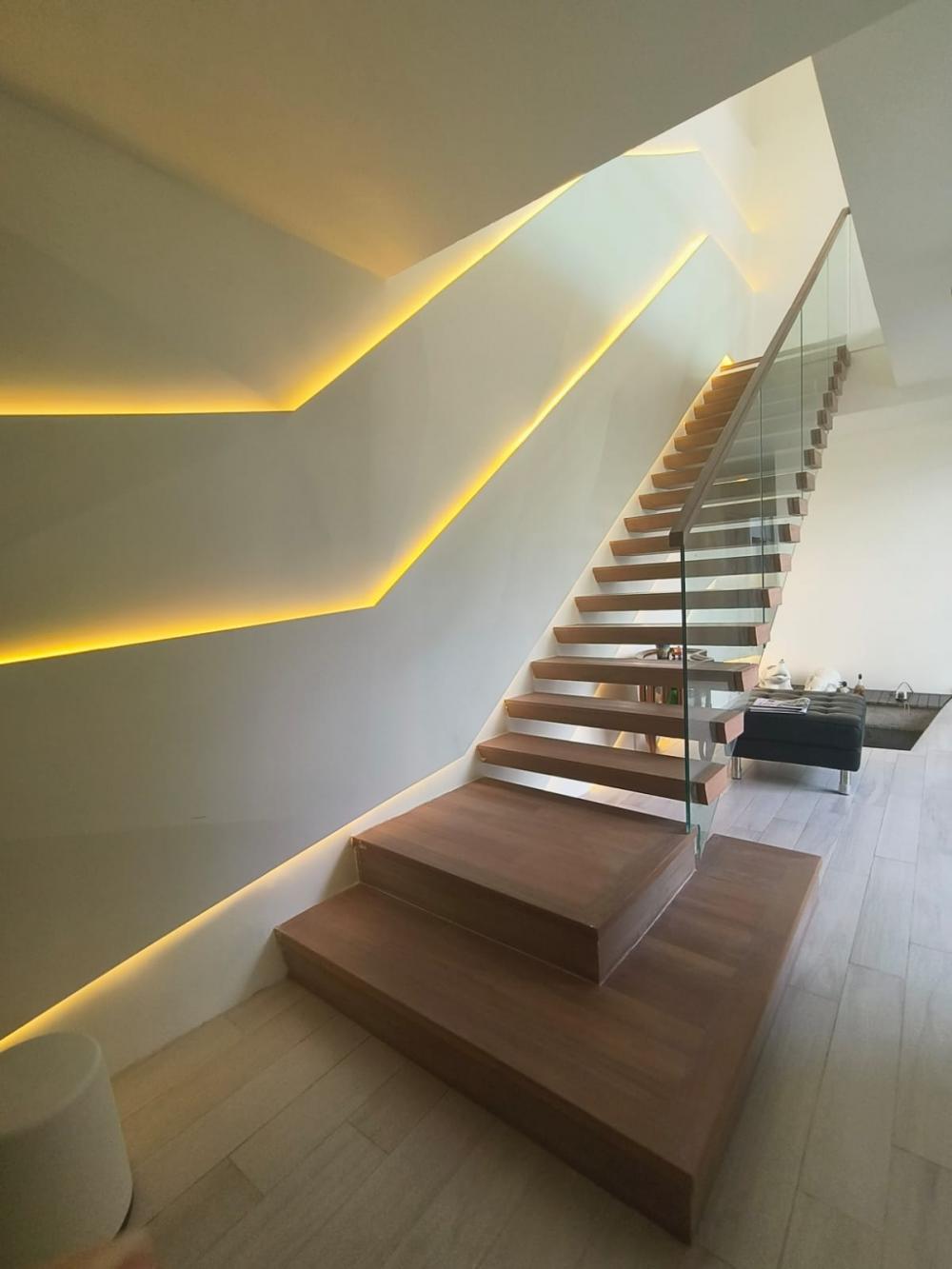 Minimalist Hallway with Feature Wall and Paintings
