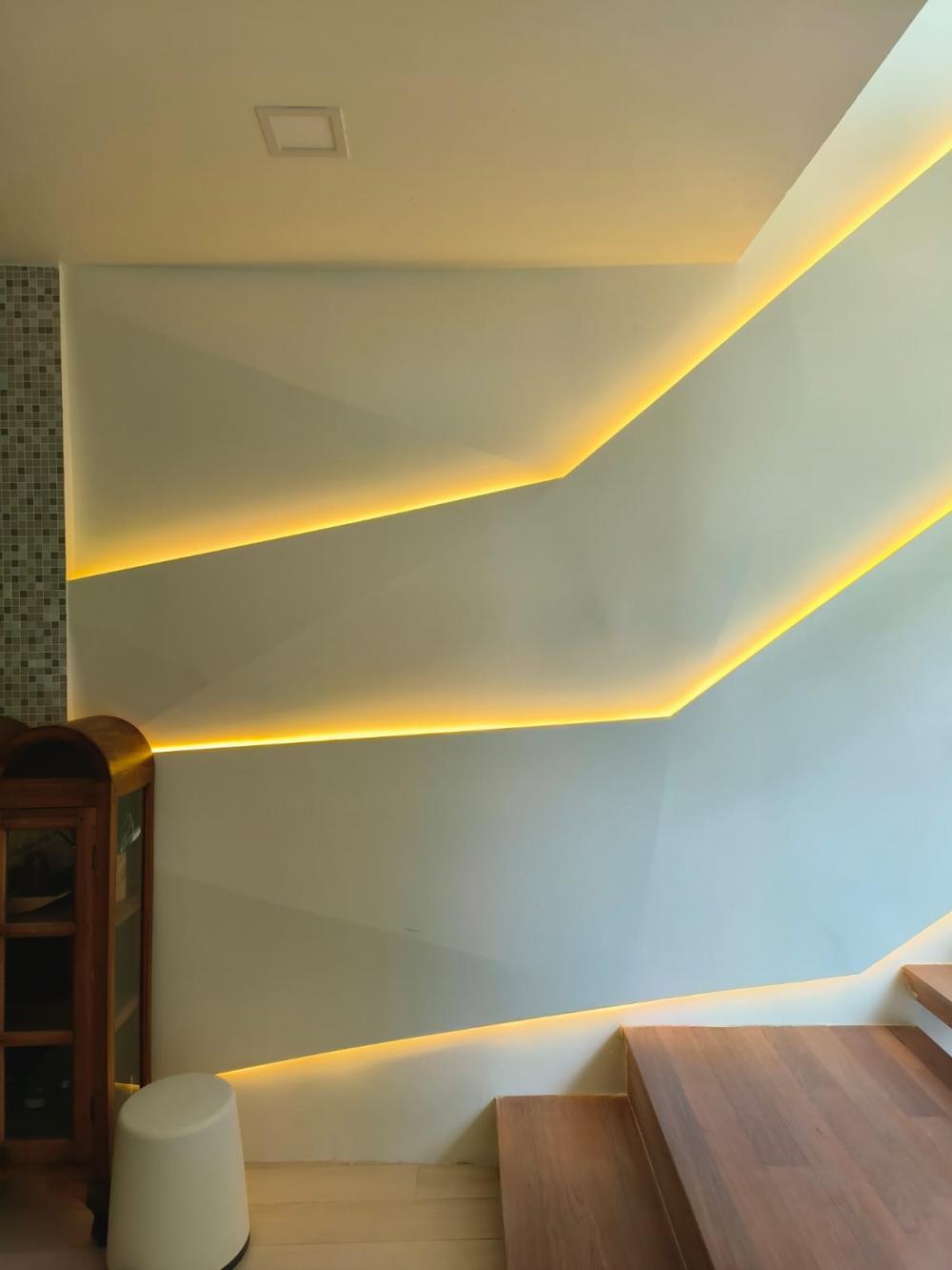 Minimalist Hallway with Feature Wall and Paintings