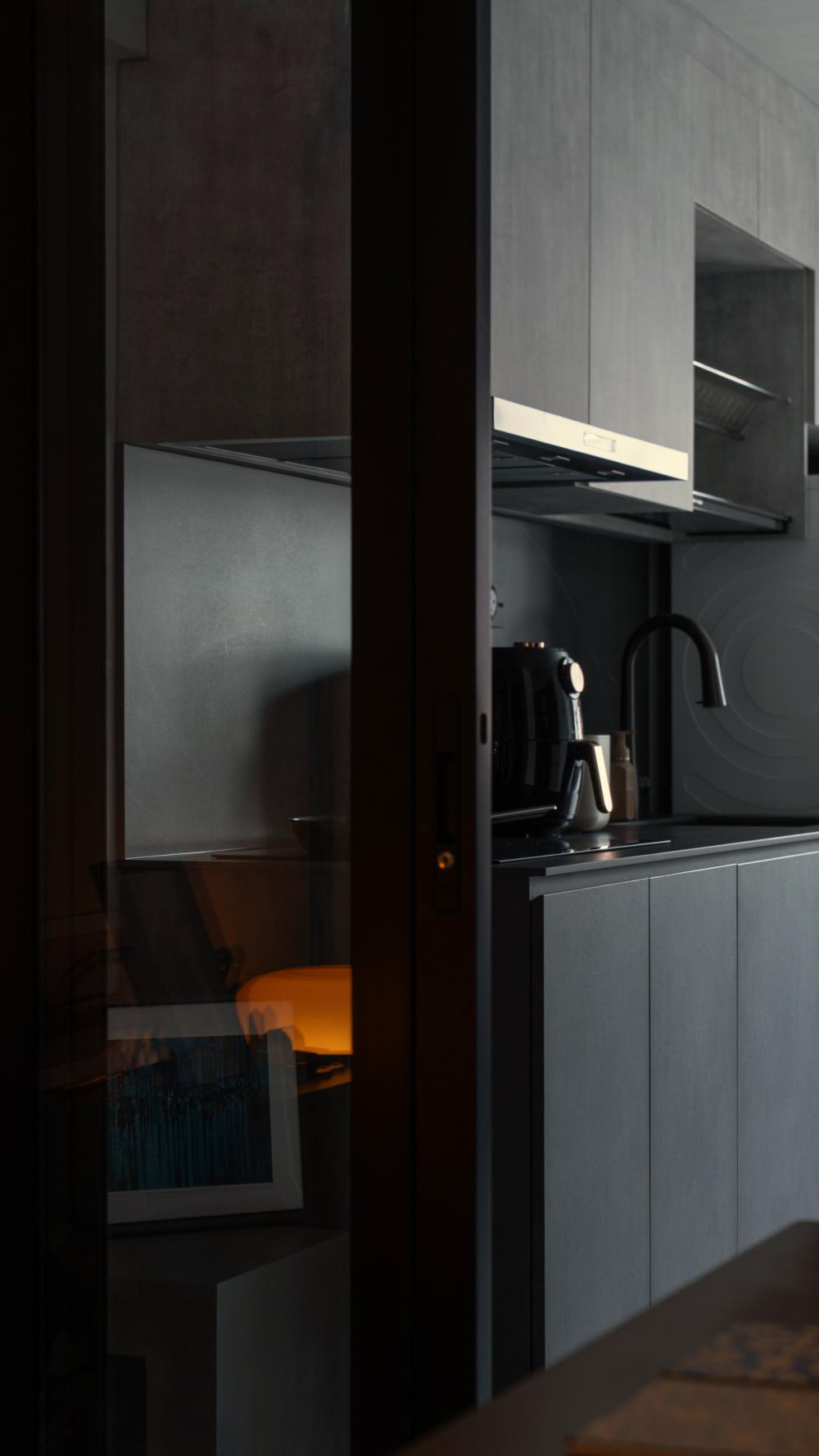 Industrial Kitchen with Wood Flooring and Kitchen Window