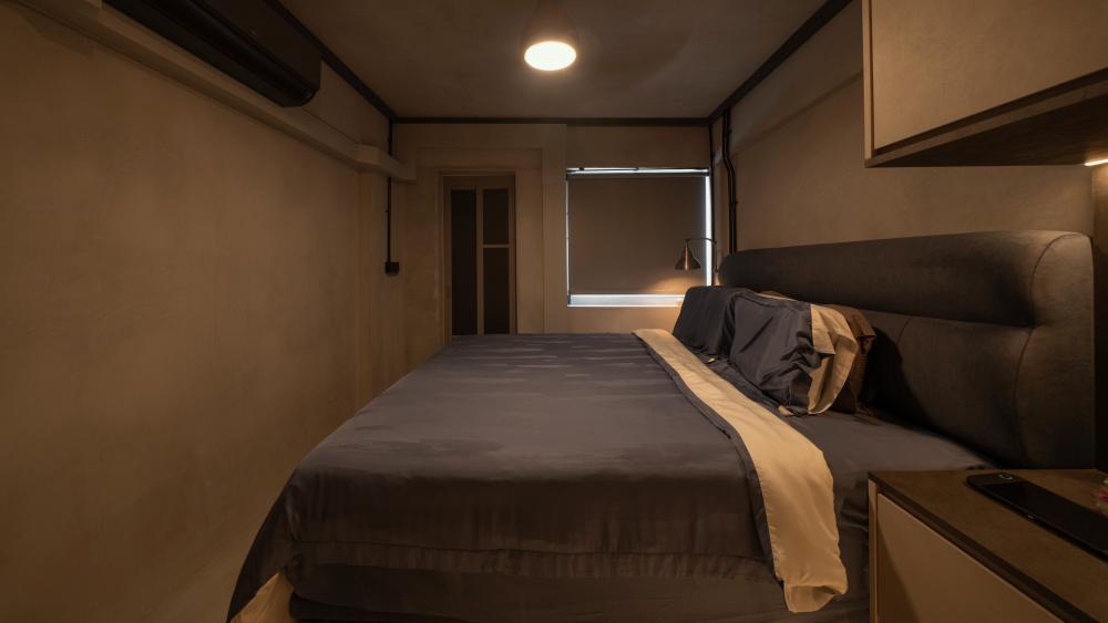 Industrial Bedroom with Cove Lighting and Ceiling Light