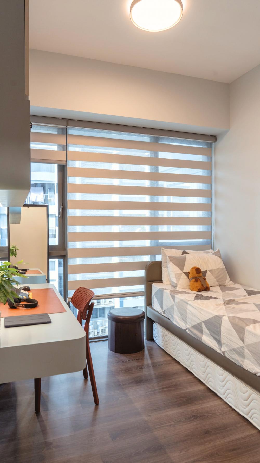 Contemporary Bedroom with Bookshelf and Homogeneous Tiles