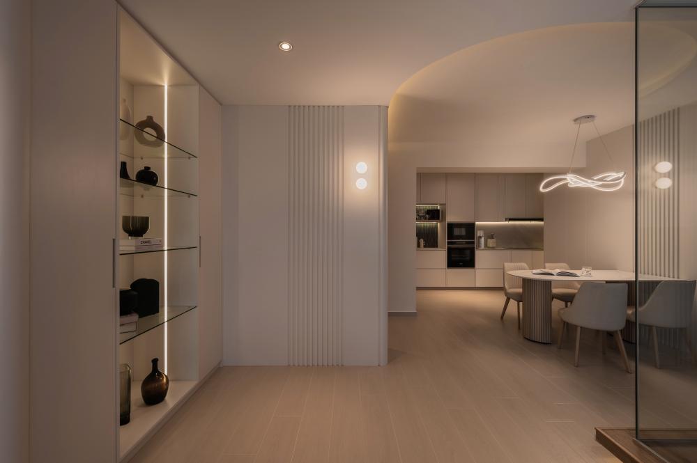 Contemporary Dining Room with Feature Wall and Lighting