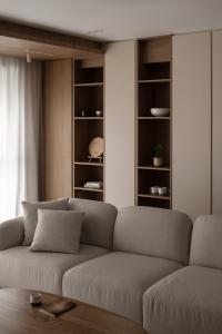 Asian Living Room at A Japandi-style HDB flat with curves