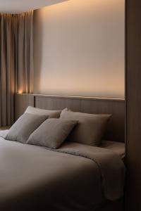 Asian Bedroom at A Japandi-style HDB flat with curves