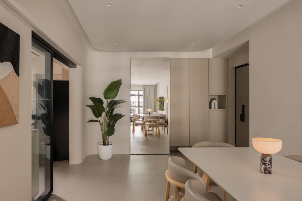 Modern Foyer with Artwork and Planters
