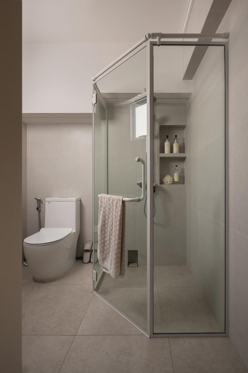 Minimalist Bathroom with Homogeneous Tiles and Shower Screen