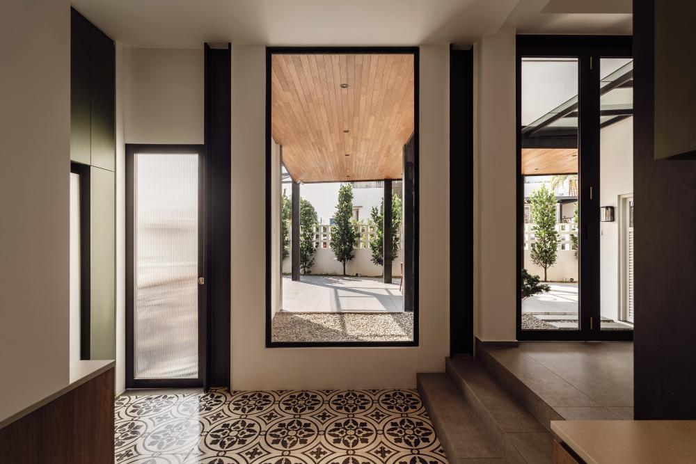 Vintage Courtyard with Homogeneous Tiles and Awning