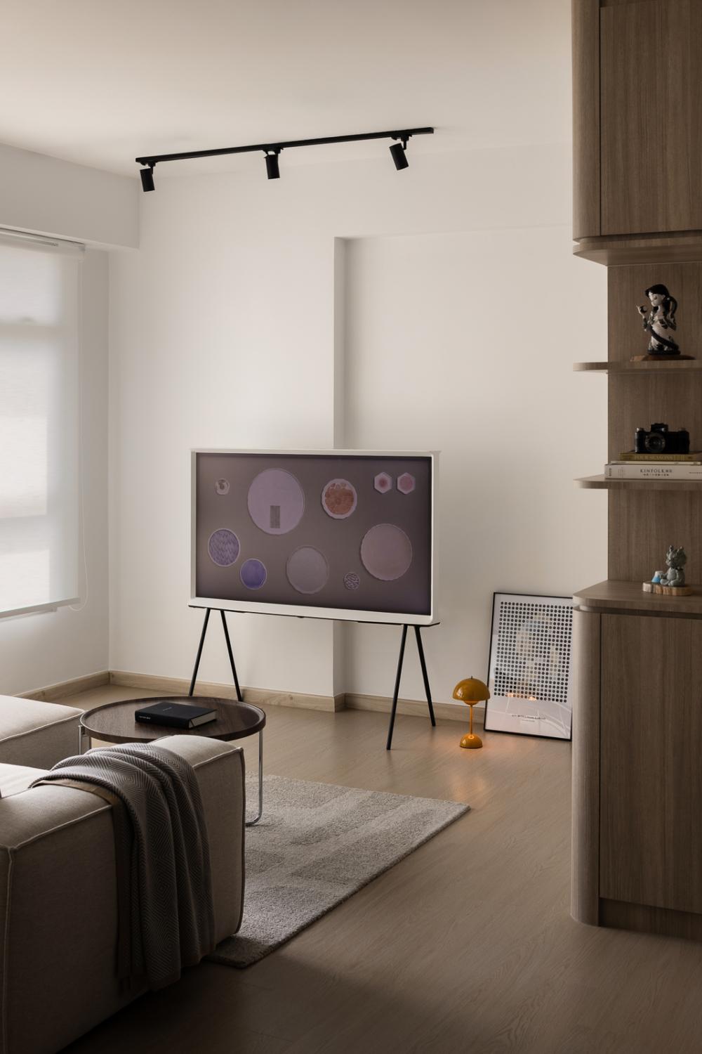 Minimalist Living Room with Bookshelf and Vinyl Flooring
