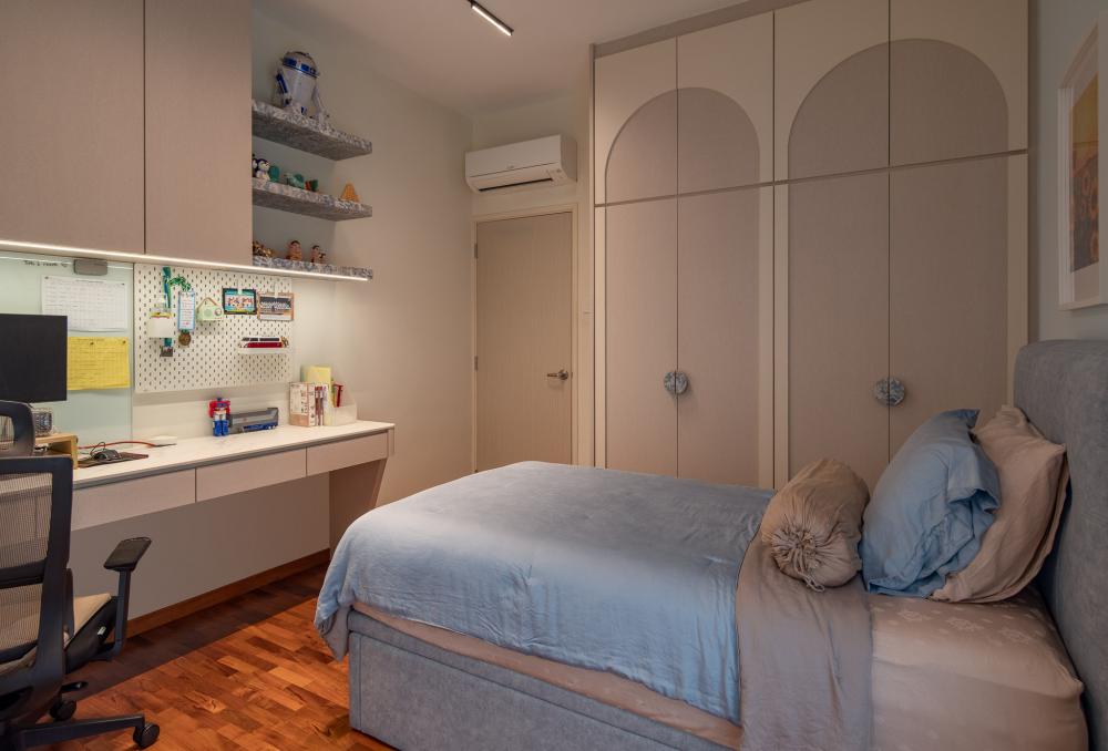 Eclectic Bedroom with Bookshelf and Wood Flooring