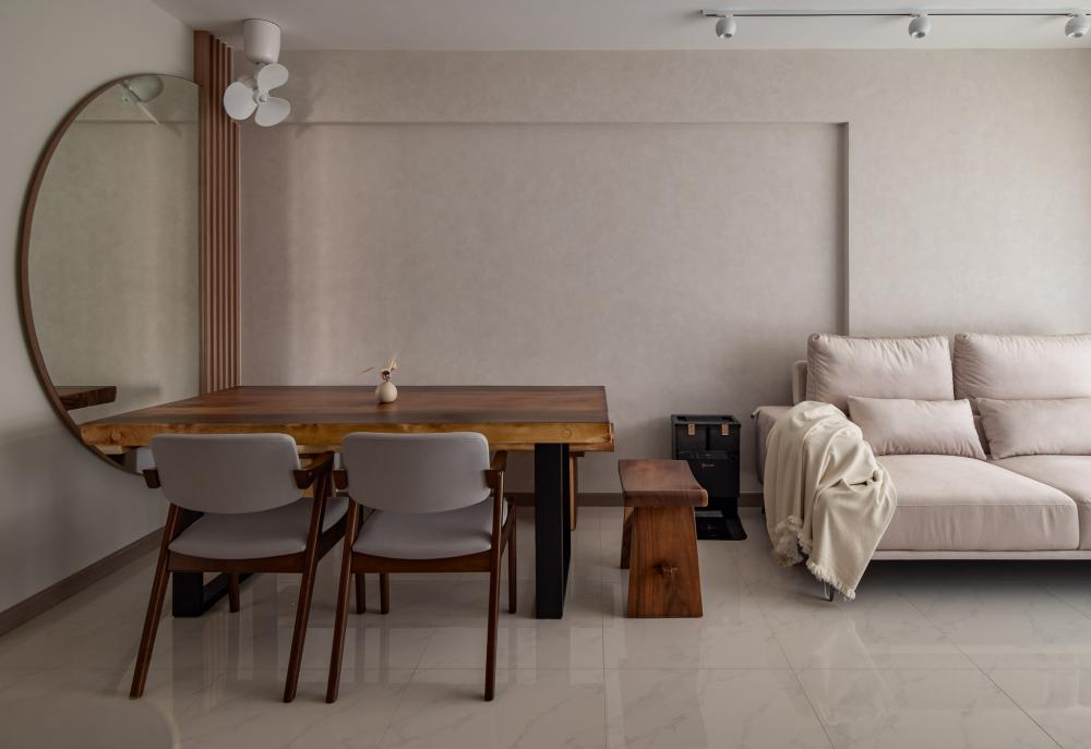 Minimalist Living Room with Homogeneous Tiles and Feature Wall