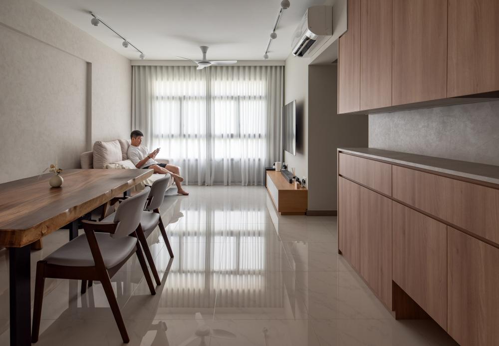 Minimalist Living Room with Homogeneous Tiles and TV Console