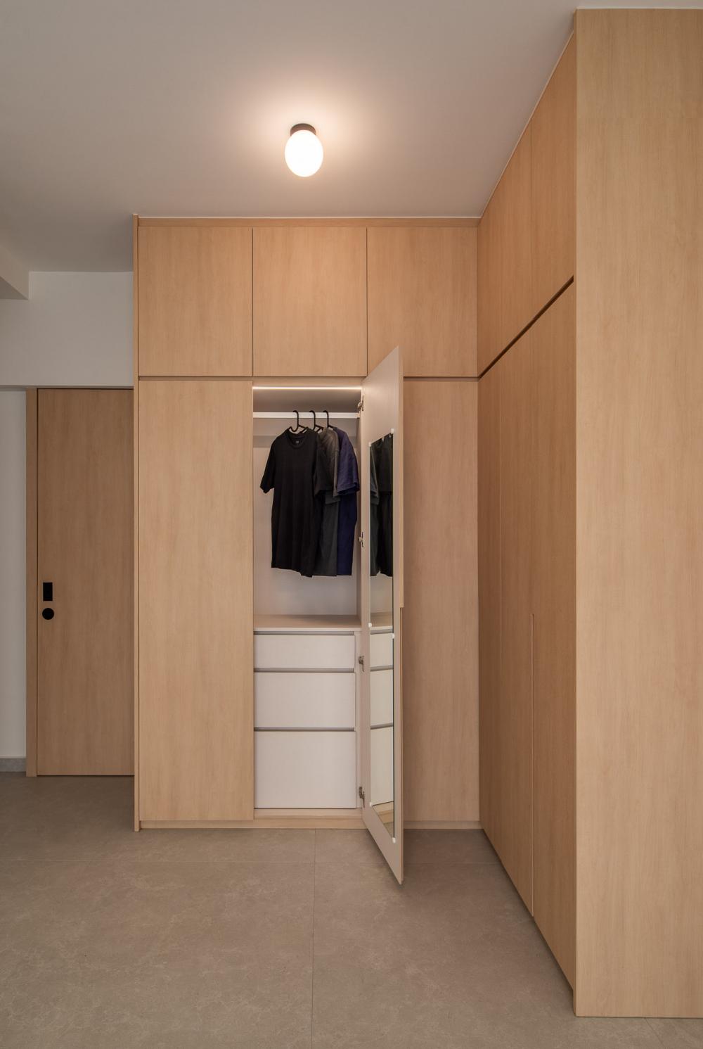 Scandinavian Bedroom with Homogeneous Tiles and Wardrobe