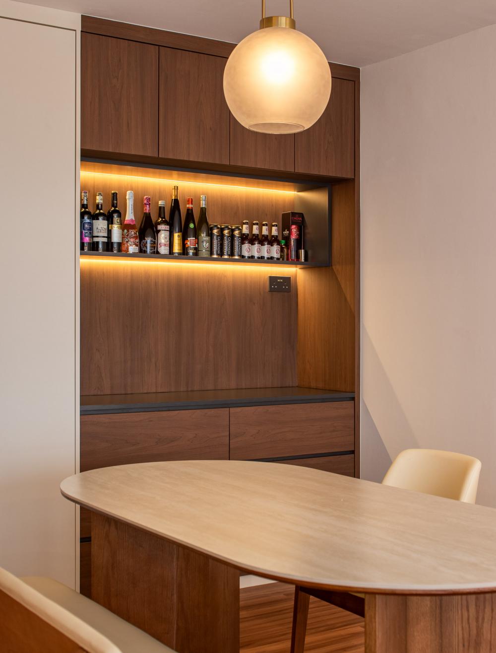Scandinavian Dining Room with Drop Light and Cove Lighting