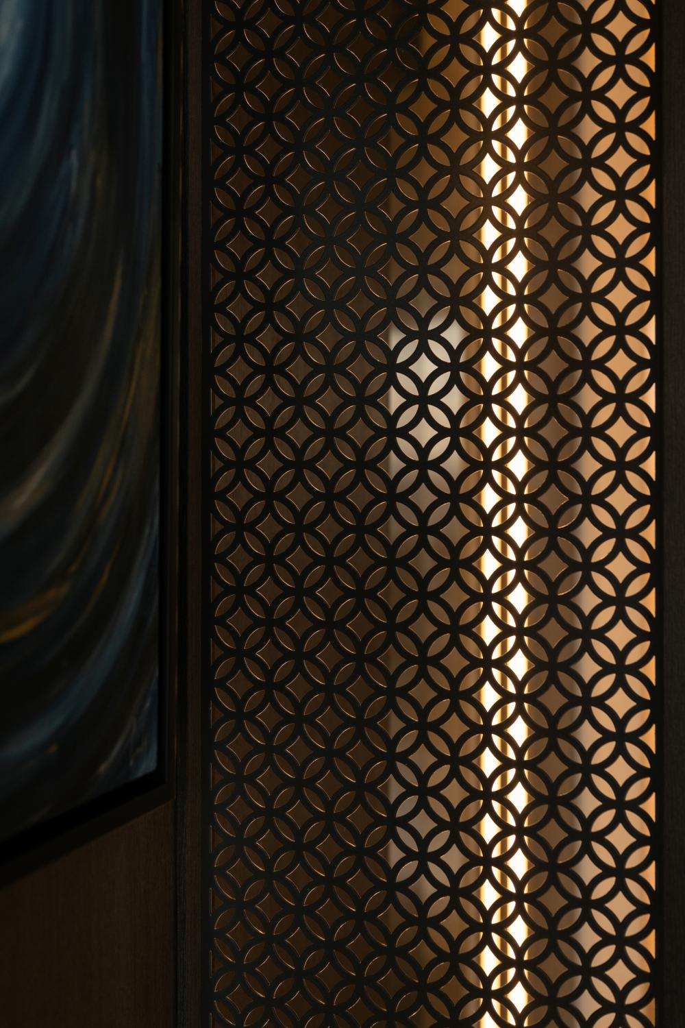 Modern Entryway with Paintings and Lighting